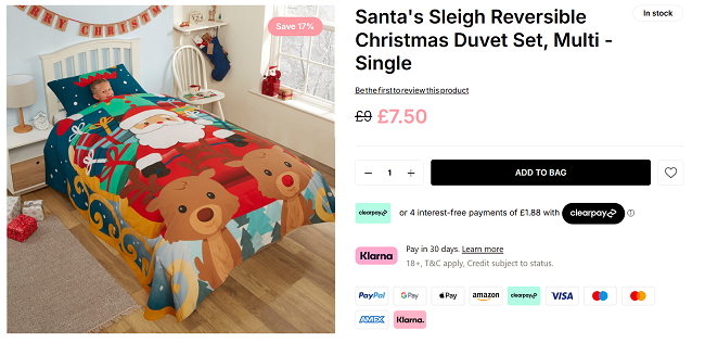 Screenshot showing Santa's Sleigh Reversible Christmas Single Duvet Set for £7.50 at Online Home Shop