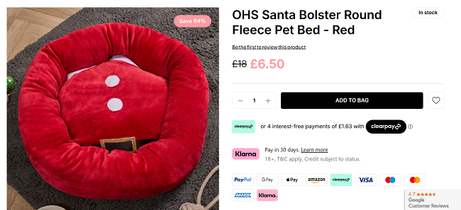 Screenshot showing Santa Bolster Round Fleece Pet Bed for £6.50 at Online Home Shop