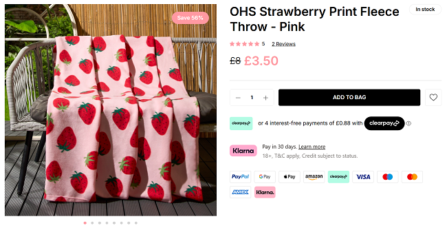 Screenshot showing Strawberry Print Fleece Throw for £3.50 at Online Home Shop