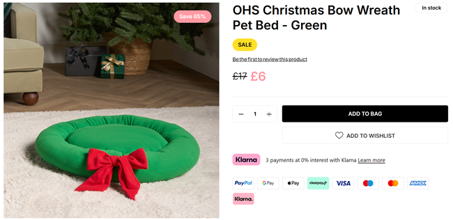 Screenshot showing Christmas Bow Wreath Pet Bed for £6 at Online Home Shop