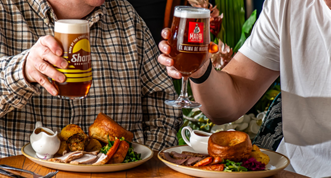 Father's Day promotional image from Ember Inns showing free beer offer